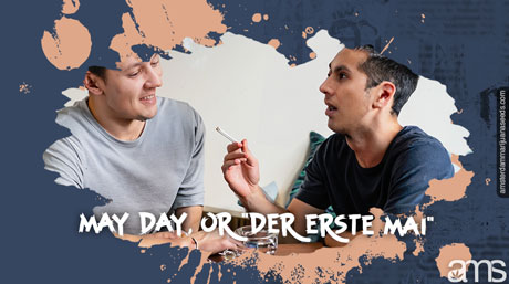 two friends at home smoking a joint